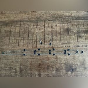 Matching navy blue double strand necklace and earrings set